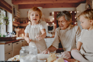 older woman with grandchildren at holidays